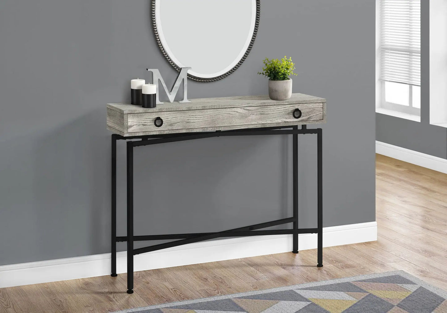 Accent console table with weathered gray wood top, two drawers, black metal legs on Tampa Home & Garden Store