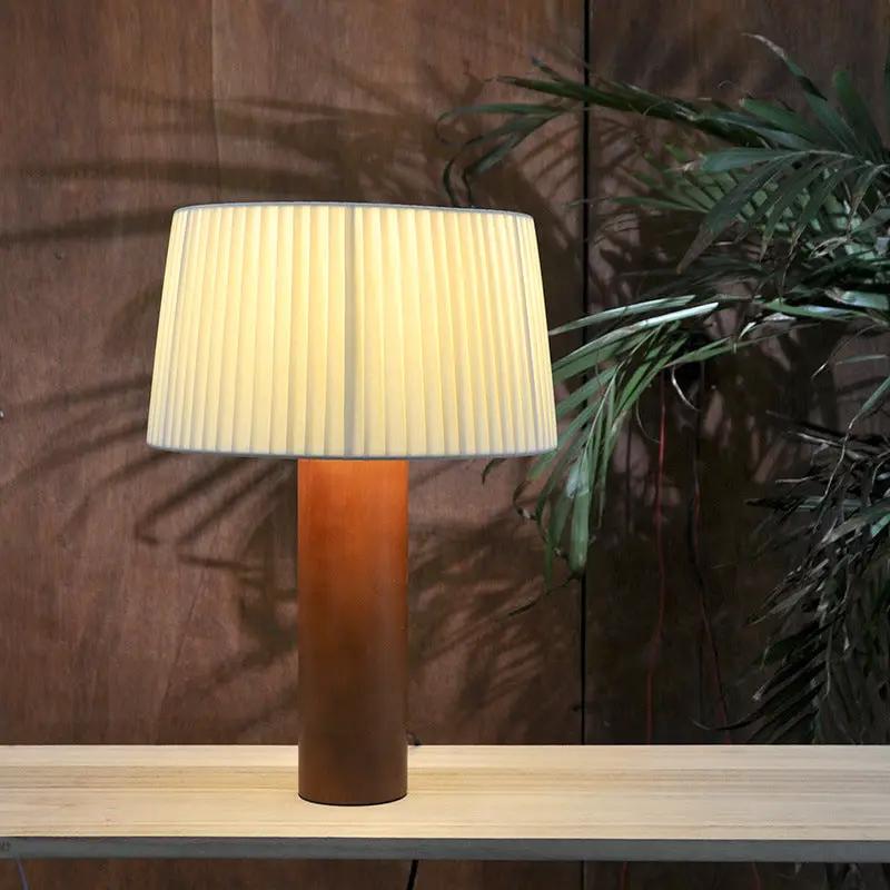 Pleated table lamp by FLIPSTYLEZLLC with solid wood cylindrical base and cream shade on Tampa Home & Garden Store