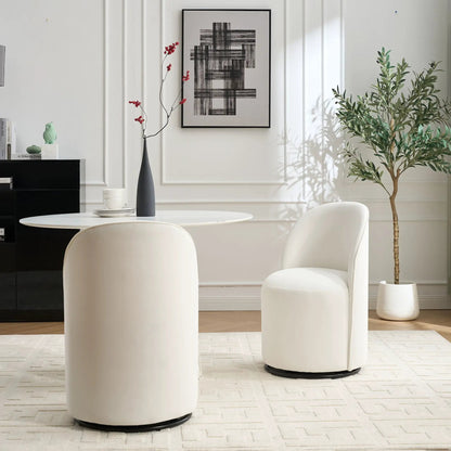 Pair of white 360 Degree Swivel Armless Dining Barrel Chairs with black bases on Tampa Home & Garden Store