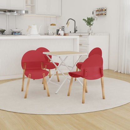 4 piece set of red chairs with wooden legs around a white folding square table in a kitchen on Tampa Home & Garden Store