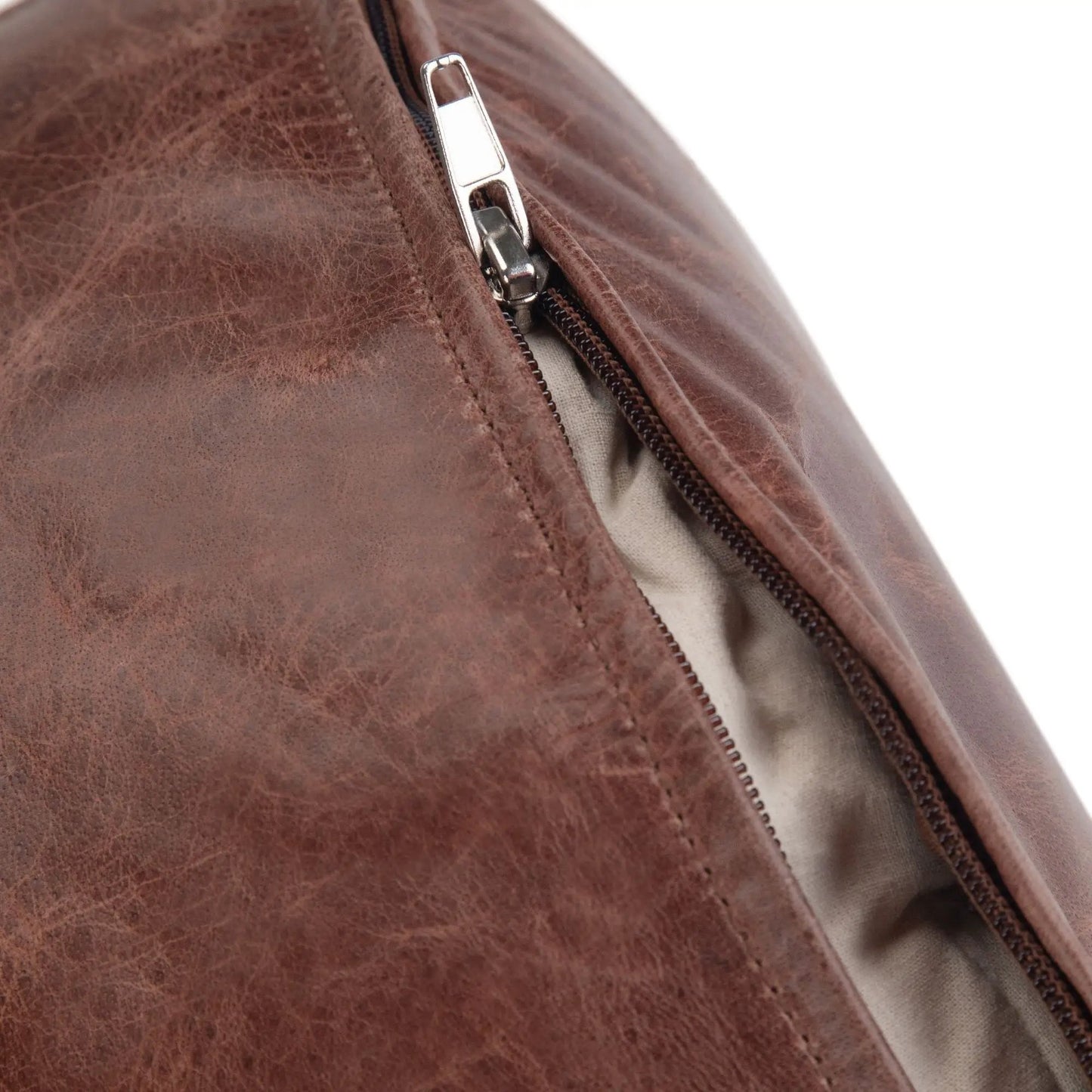 Connor Handcrafted Round Pouf leather cover in rich brown with exposed metal zipper on Tampa Home & Garden Store