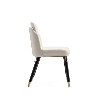 Estelle dining chair beige faux leather with dark legs and gold tips on Tampa Home & Garden Store