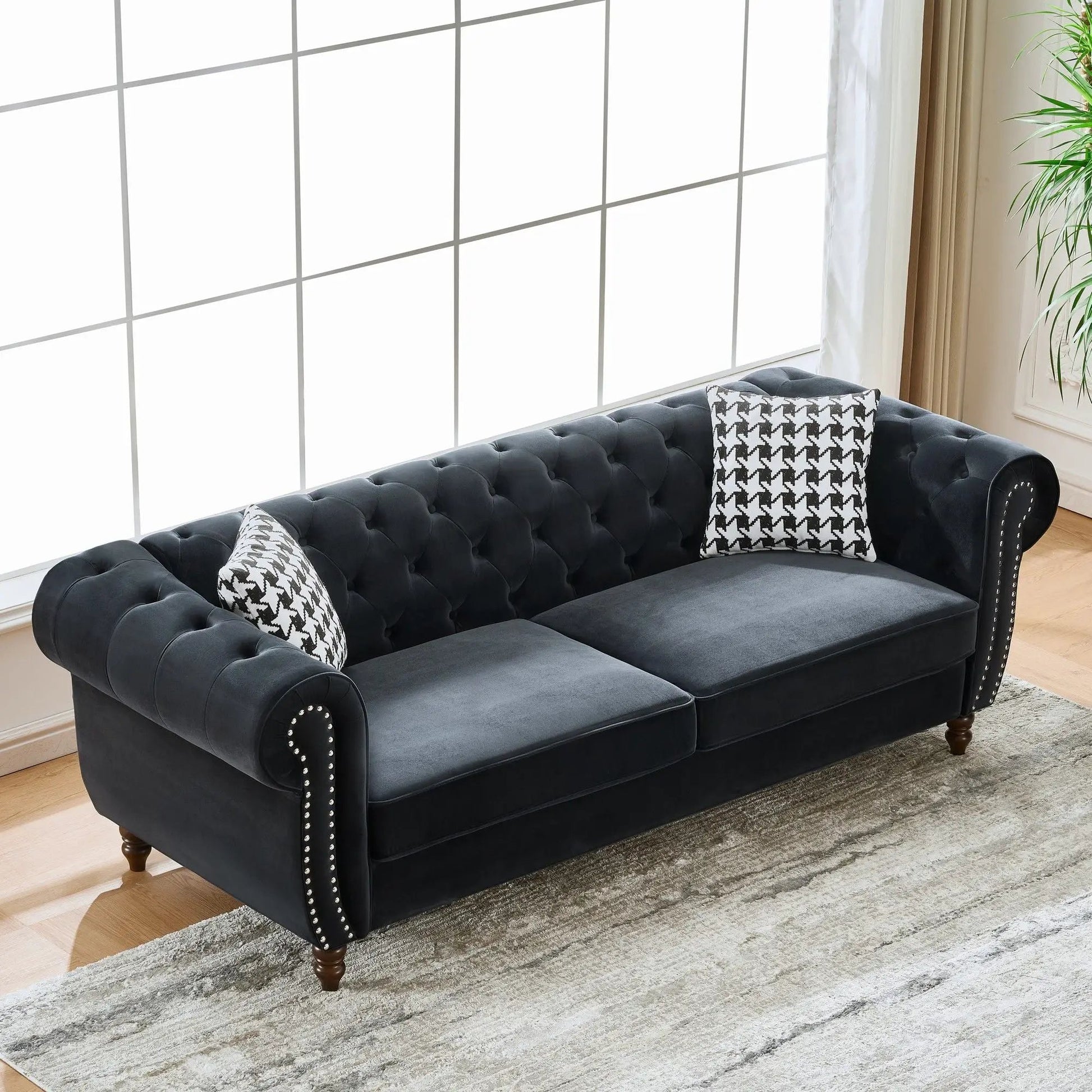 Chesterfield Upholstery Fabric Sofa with roll arms, tufted seats and nailhead trim in dark gray on Tampa Home & Garden Store
