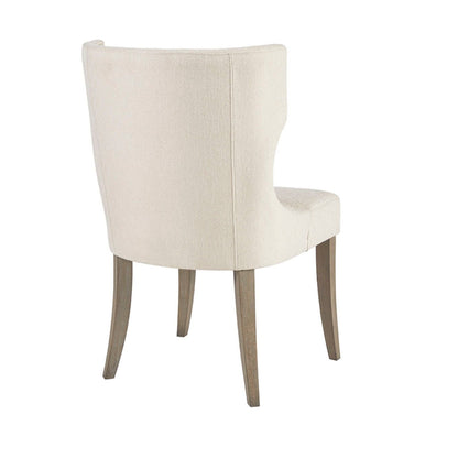 Cream wingback dining chair with textured upholstery and wood legs by HouseOfZazla on Tampa Home & Garden Store