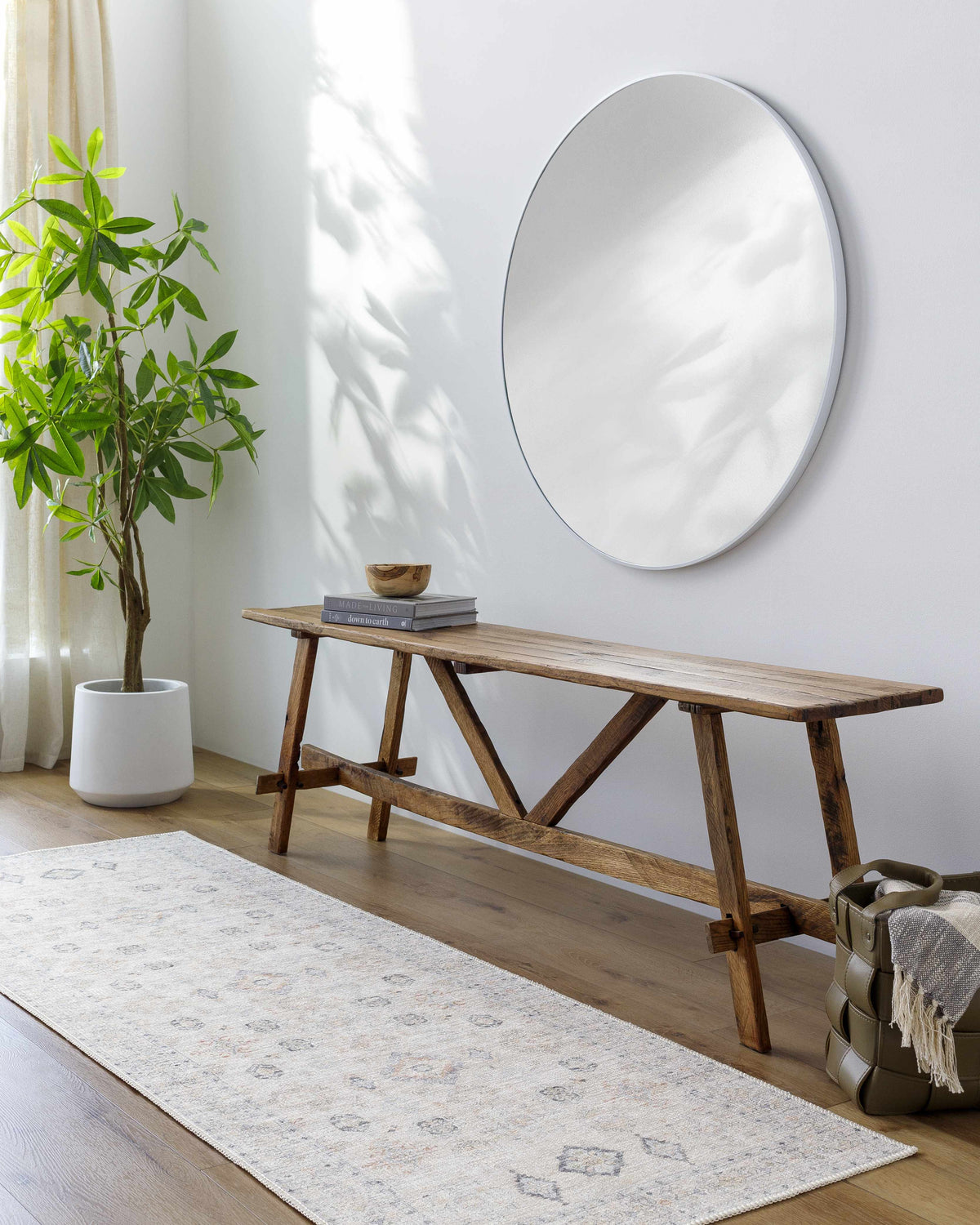 Beige Beckett washable rug, soft neutral with subtle diamond motifs, shown in living space on Tampa Home & Garden Store