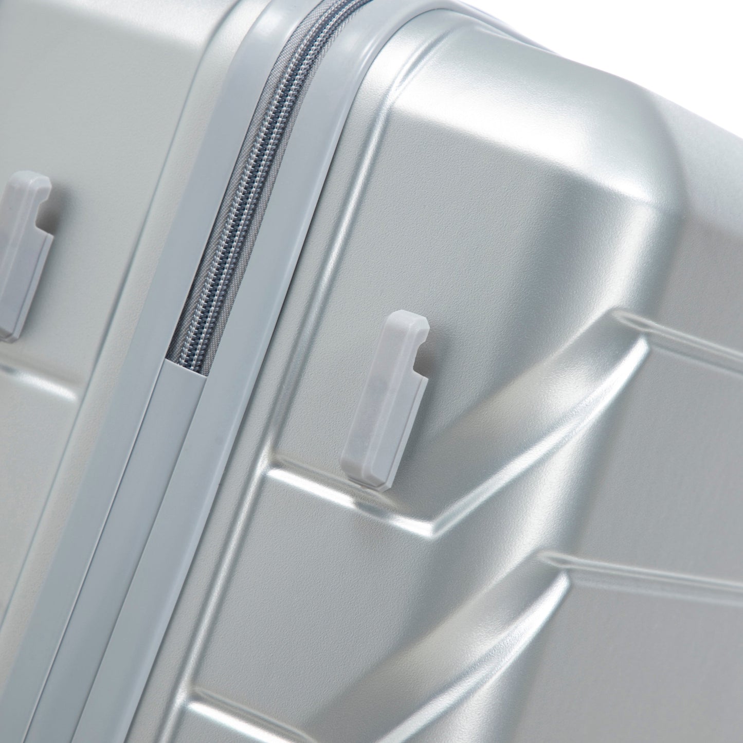3-Piece ABS luggage set closeup of silver suitcase exterior zipper track on Tampa Home & Garden Store