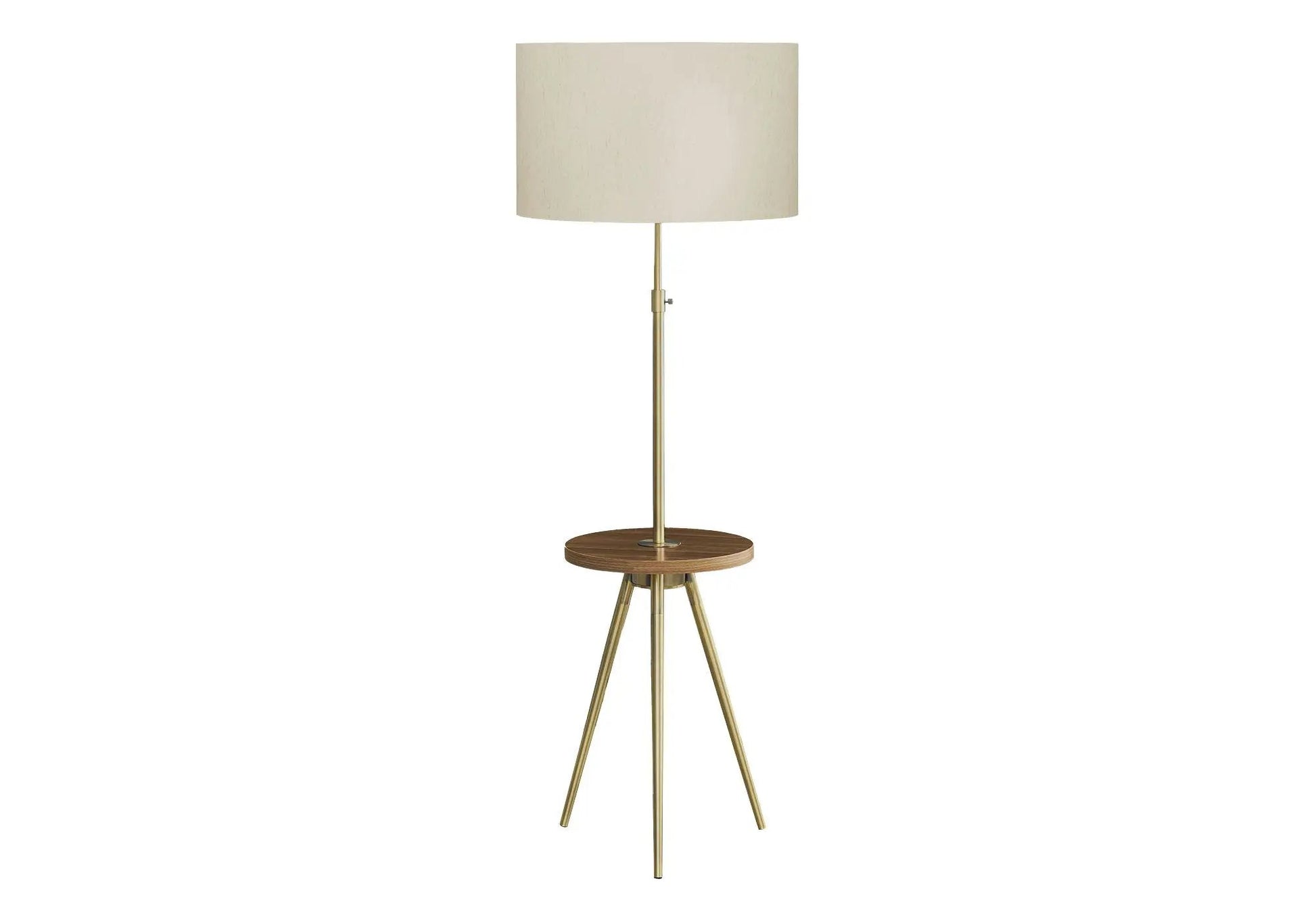 Floor lamp lighting with brass tripod base and beige fabric shade on Tampa Home & Garden Store