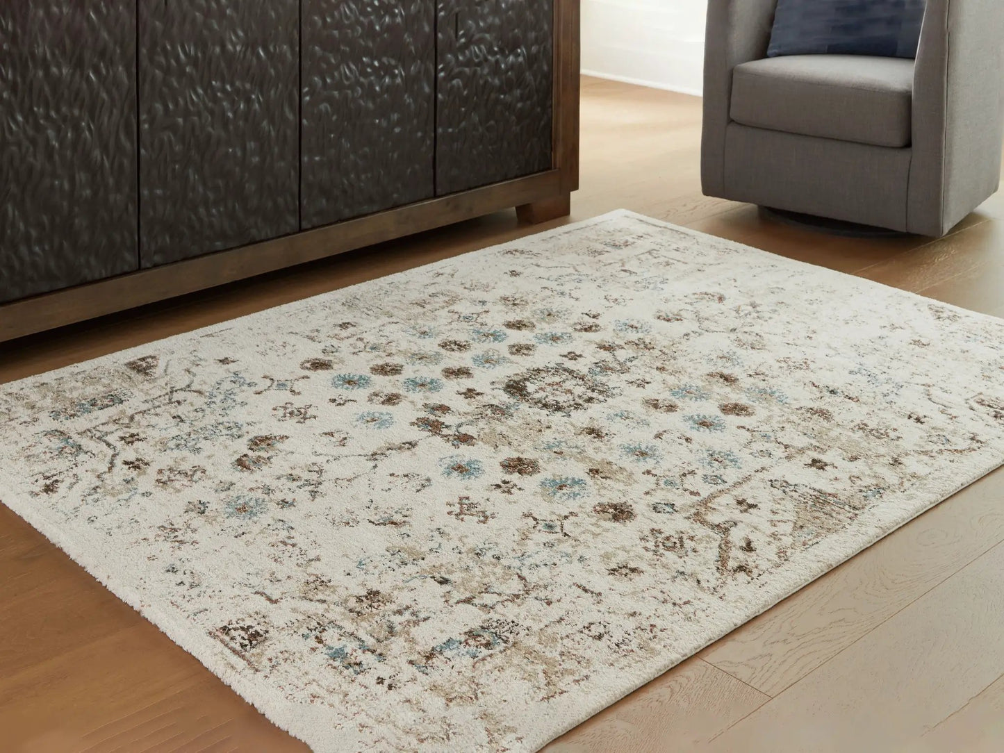 Jossler Rug beige distressed area rug with brown and blue accents Unique Piece Furniture on Tampa Home & Garden Store
