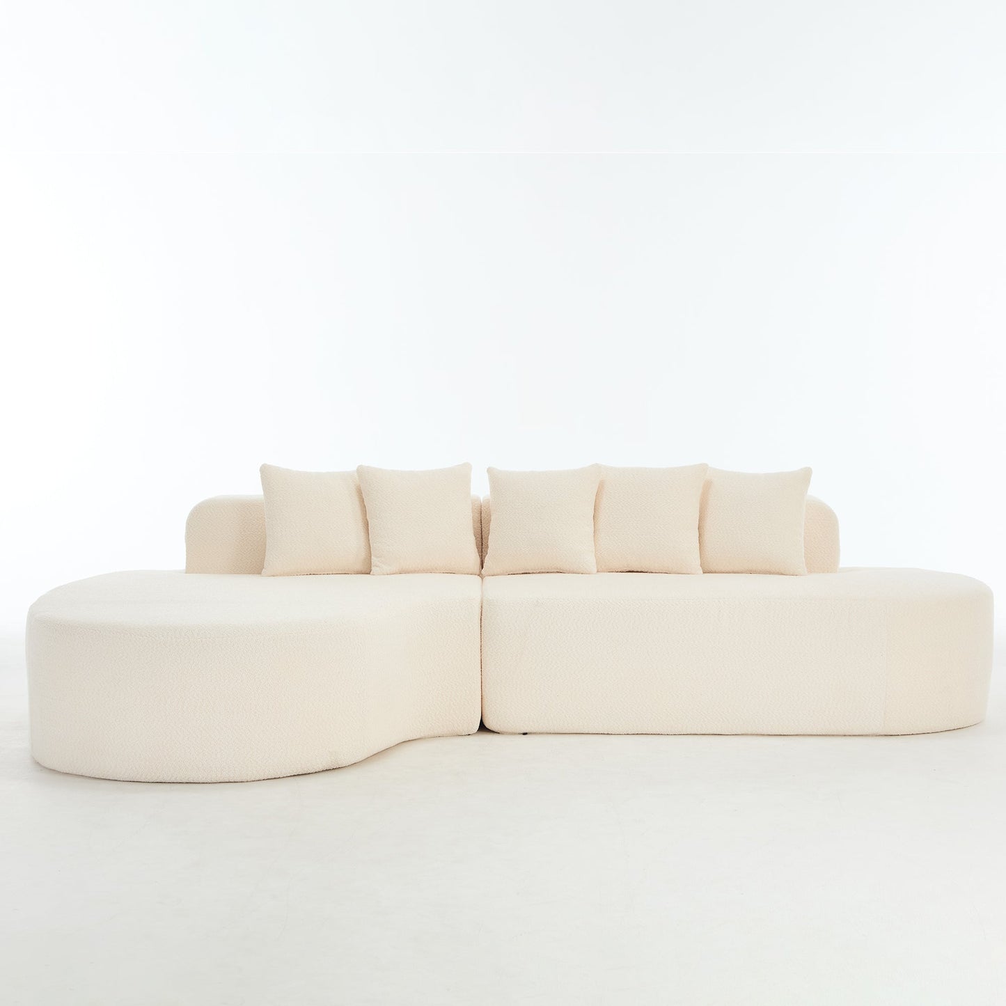 Curved Sectional Sofa and Ivory Chenille Pillows