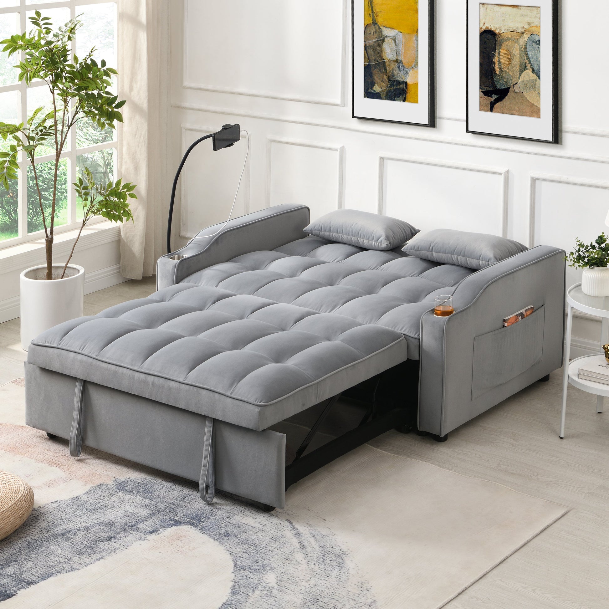 Gray velvet sleeper loveseat futon with pullout bed, tufted cushions in a modern living room on Tampa Home & Garden Store