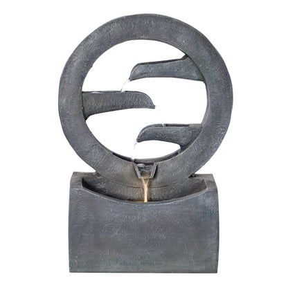 Gray circular polyresin outdoor fountain with split-ring design and flowing water on Tampa Home & Garden Store