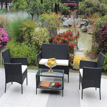 4 PC Rattan Outdoor Set with cushioned black wicker chairs and glass table on Tampa Home & Garden Store