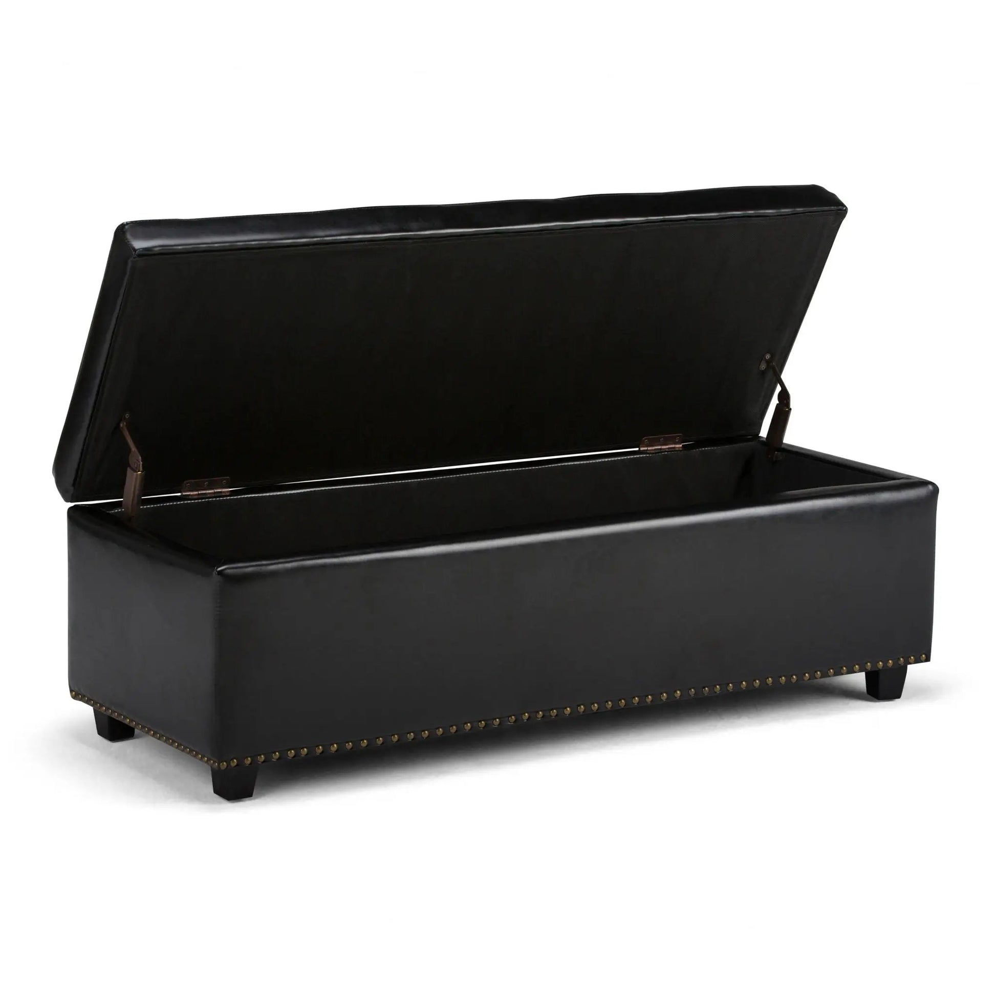 Hamilton upholstered storage ottoman in black faux leather with brass nailhead trim on Tampa Home & Garden Store