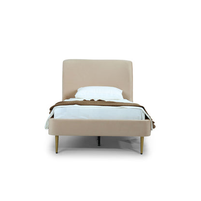 Mid-Century Modern upholstered bed with curved beige headboard and gold legs on Tampa Home & Garden Store