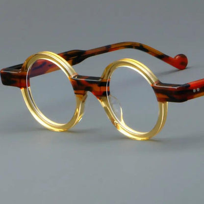 Retro acetate round frames with gold rims and tortoise-pattern temples by FLIPSTYLEZLLC on Tampa Home & Garden Store