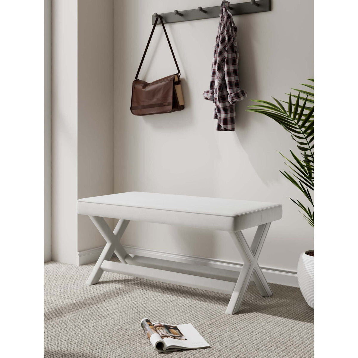 Accent bench with piped cushion and white solid wood frame, brown bag visible on Tampa Home & Garden Store