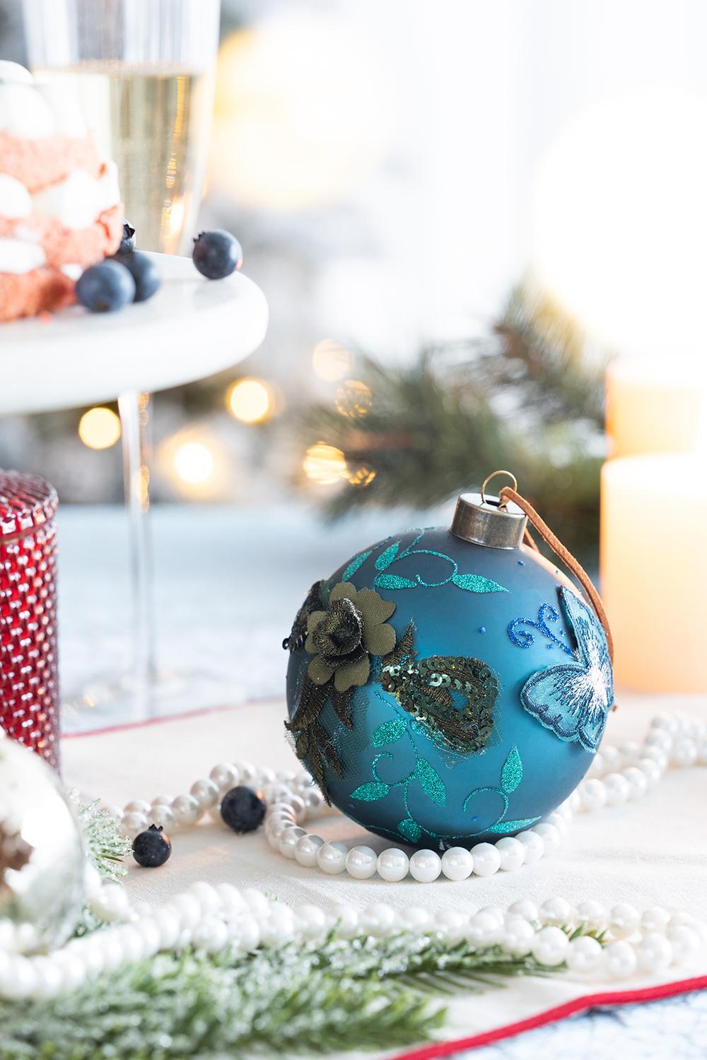 Light blue glass Christmas ball ornament with teal floral butterfly glitter HouseOfZazla on Tampa Home & Garden Store