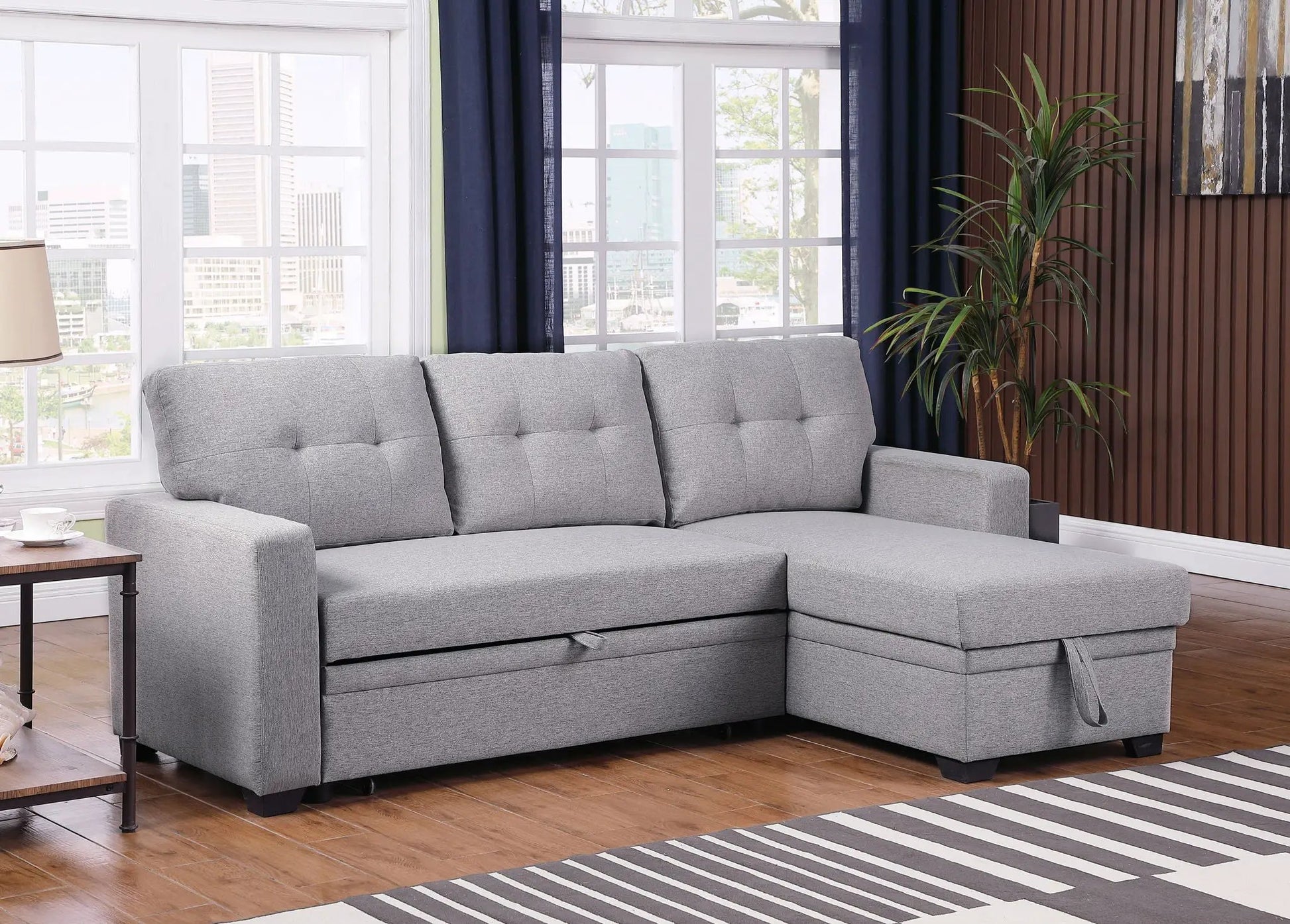 Upholstered pull-out sleeper sectional sofa with chaise in gray fabric on Tampa Home & Garden Store