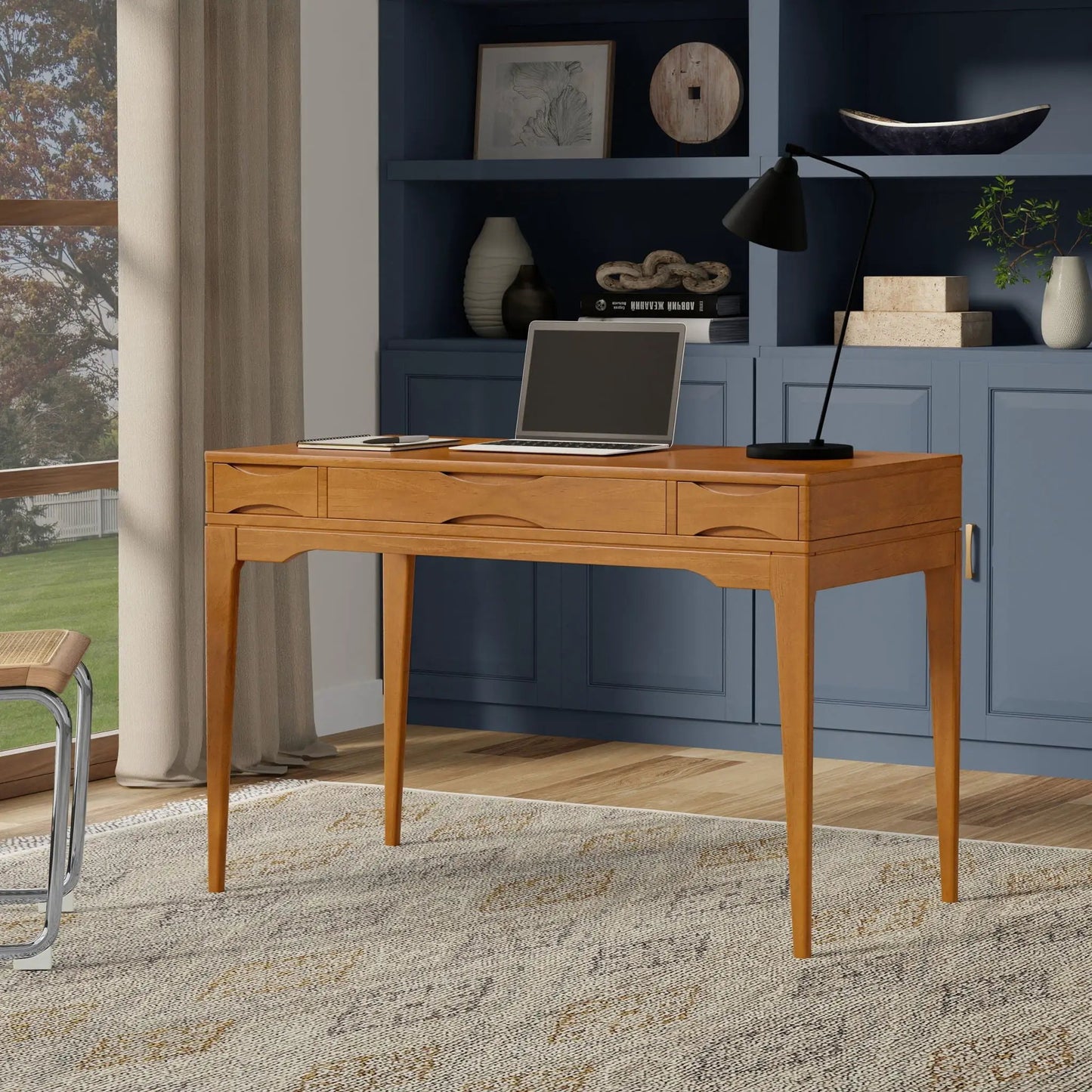 Harper Handcrafted Desk, light oak writing desk with drawers in a blue cabinet space, laptop on Tampa Home & Garden Store