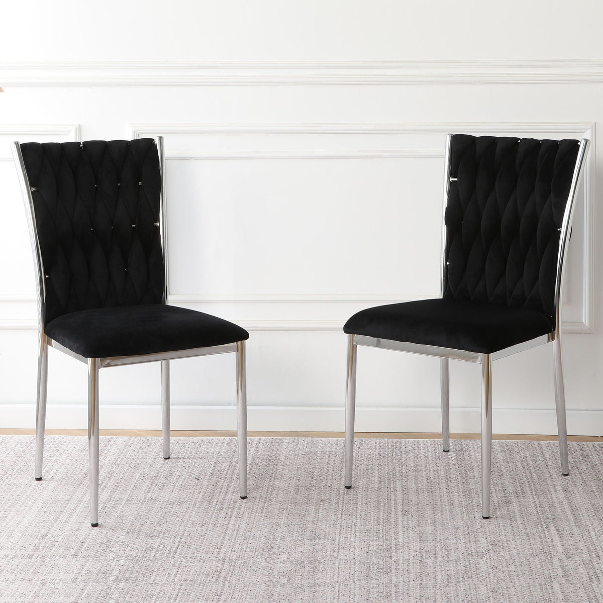 Set of 2 black fabric dining chairs with tufted back and chrome legs on Tampa Home & Garden Store