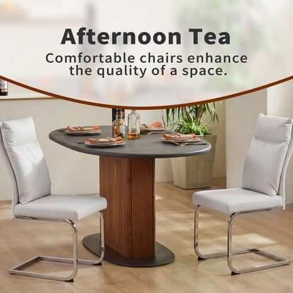 Modern dining chair set with white upholstery and chrome cantilever legs on Tampa Home & Garden Store