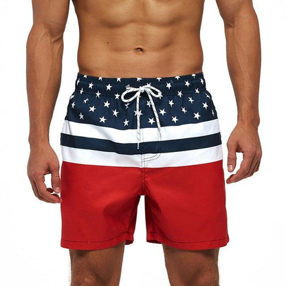 Men's boardshorts with starry navy top, white stripes, red bottom, quick-dry mesh-lined trunks on Tampa Home & Garden Store