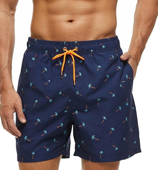 Men's Stevvex navy blue boardshorts with orange drawstring and palm tree print, quick-dry on Tampa Home & Garden Store