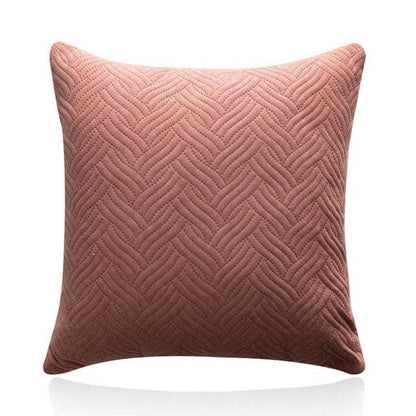 Soft velvet throw pillow cover in blush pink with a quilted braided pattern on Tampa Home & Garden Store