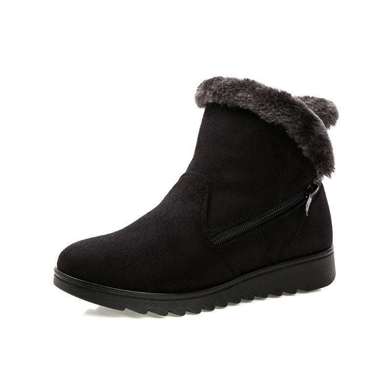Black suede women's ankle boot with faux fur collar and side zipper, rugged lug sole on Tampa Home & Garden Store