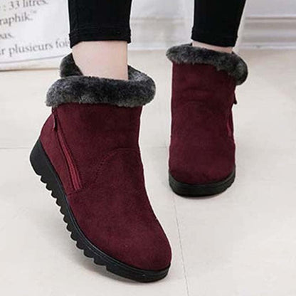 Red suede ankle boots with grey faux fur cuff, black lug sole, side zip, 2 boots on Tampa Home & Garden Store