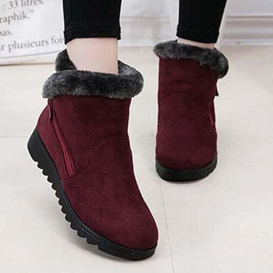 Red suede ankle boots with grey faux fur cuff, black lug sole, side zip, 2 boots on Tampa Home & Garden Store