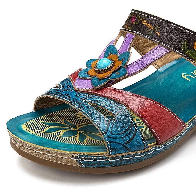 Women's sandals by Stevvex with blue floral embellishment, platform slide on Tampa Home & Garden Store