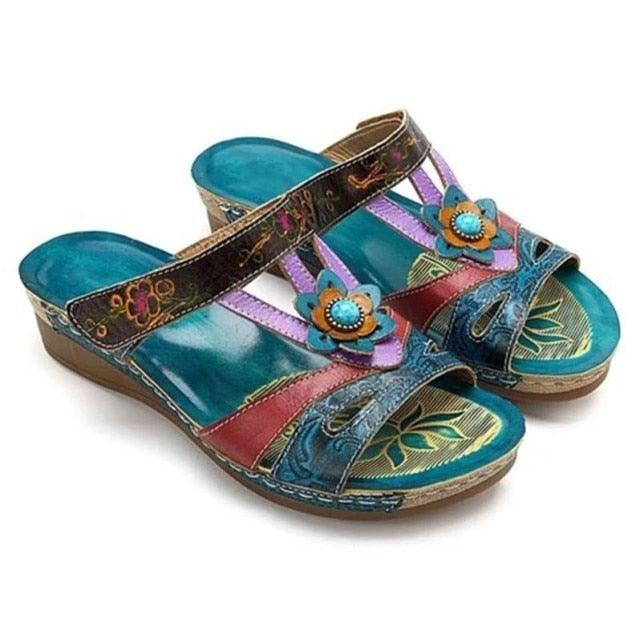 Women's platform sandals with colorful straps and flower embellishments, teal footbeds on Tampa Home & Garden Store