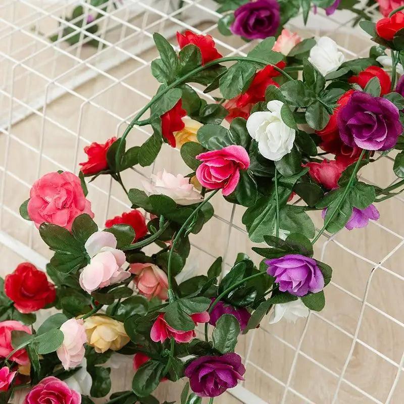 Rose artificial garland 250cm with pink red white purple blossoms and green leaves Stevvex on Tampa Home & Garden Store