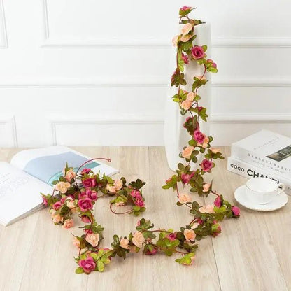 Artificial rose garland 250cm Stevvex pink peach roses with green leaves for wedding decor on Tampa Home & Garden Store