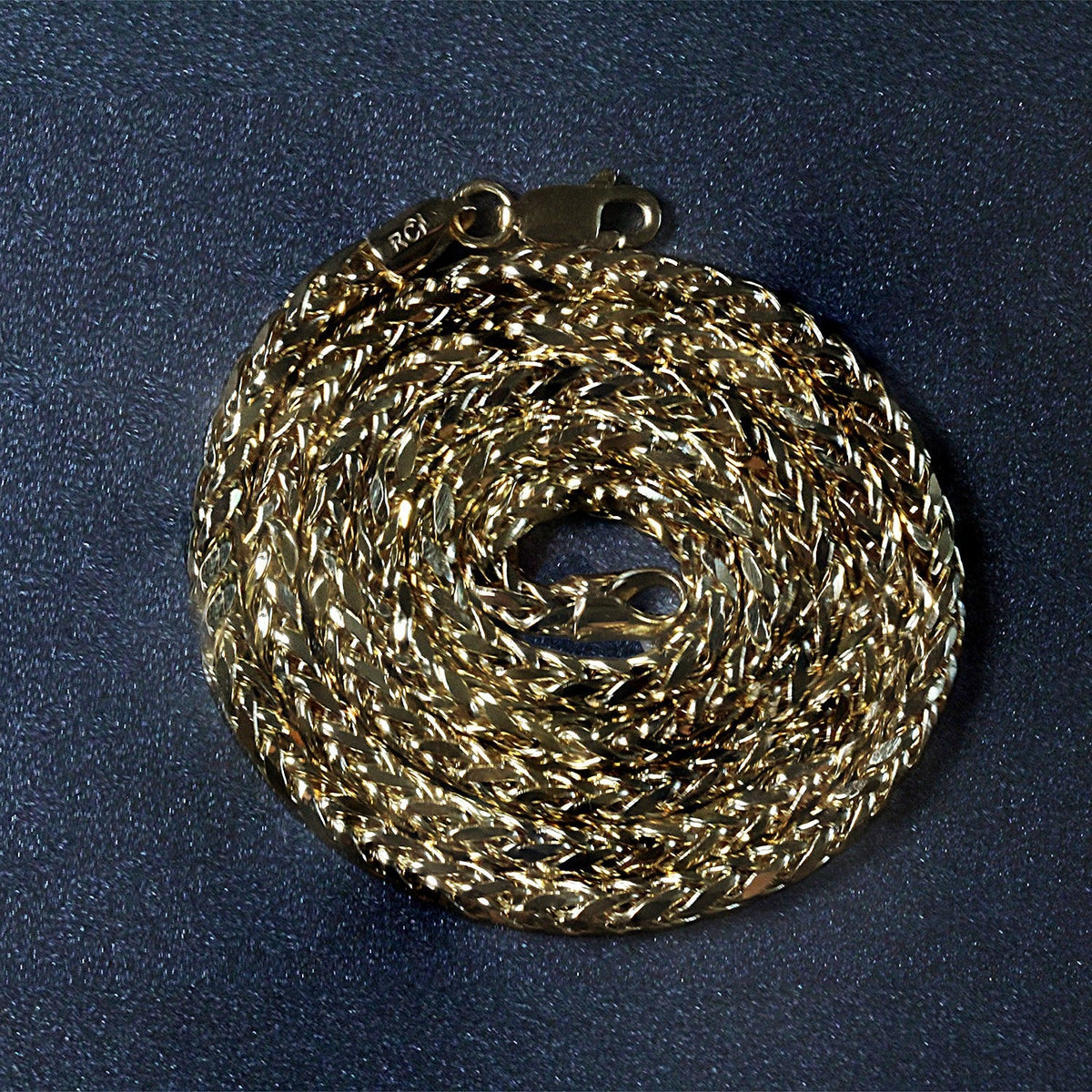 3.15mm 14k yellow gold diamond-cut round Franco chain necklace, coiled with lobster clasp on Tampa Home & Garden Store