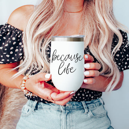 Gia Roma Because Life 17oz tumbler, white insulated cup with silver lid, held by woman on Tampa Home & Garden Store