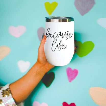 Because Life 17oz tumbler by Gia Roma, white body with metallic lid, held in hand on Tampa Home & Garden Store