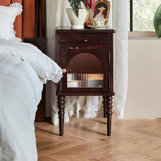 American-style solid wood bedside table with glass-front door and dark finish on Tampa Home & Garden Store