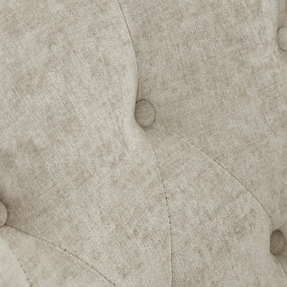 Beige swivel chair upholstery close-up with textured fabric and tufted cushions on Tampa Home & Garden Store