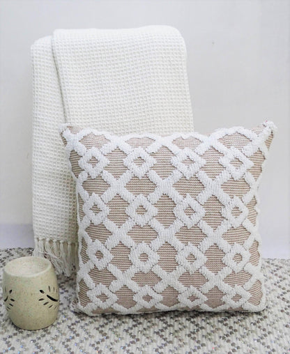 Vibhsa beige 20x20 throw pillow with white crochet lattice trim and white waffle pillow behind on Tampa Home & Garden Store