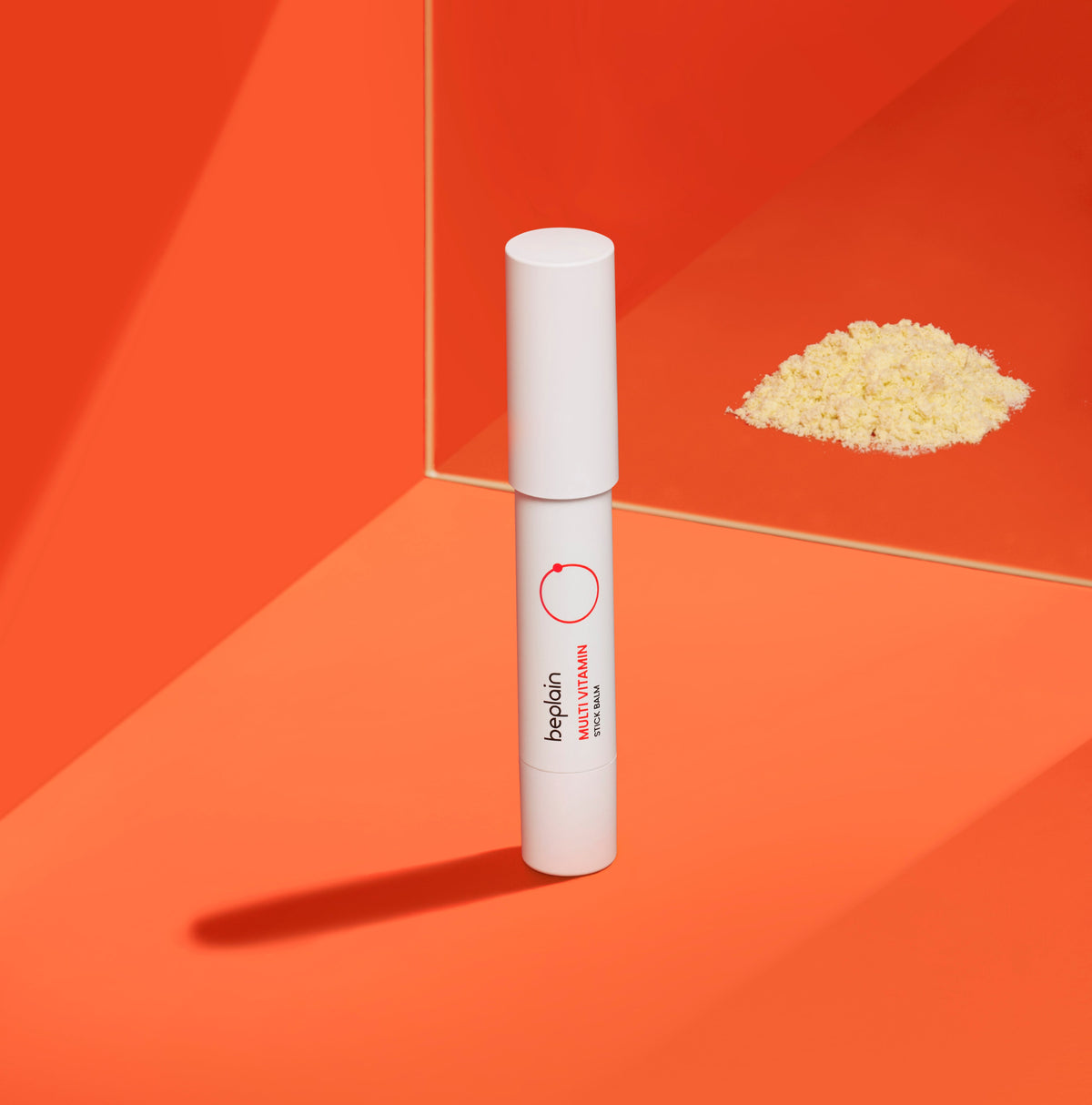 beplain Multi Vitamin Stick Balm 2.9g white face balm stick on vibrant orange background on Tampa Home & Garden Store