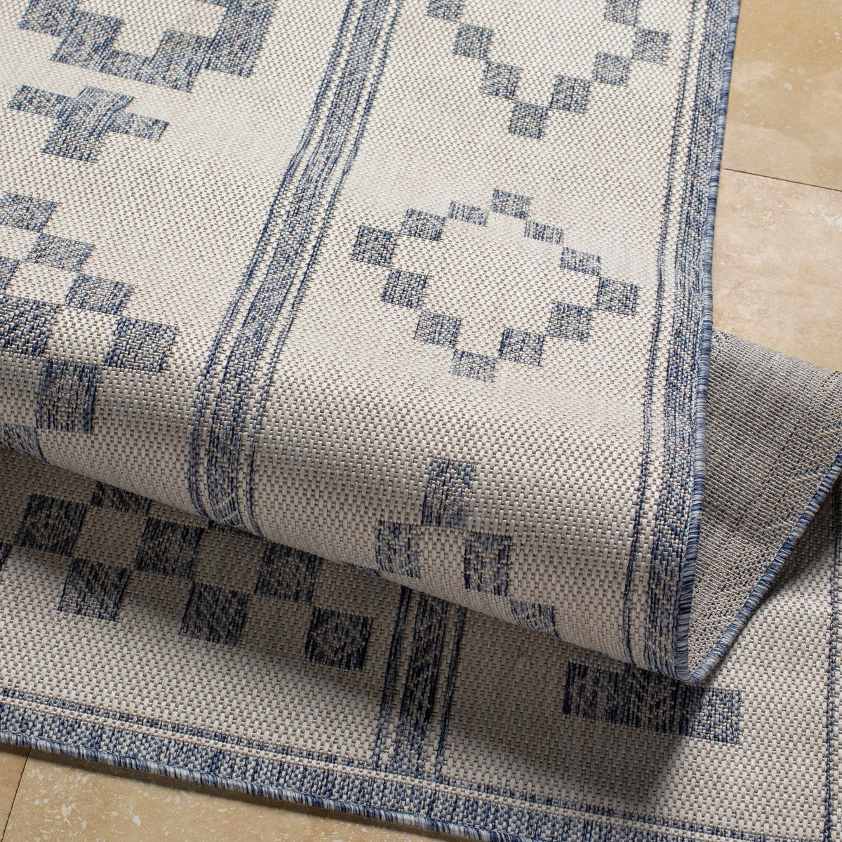 Besao Indoor & Outdoor Rug by Boutique Rugs blue beige geometric with textured weave on Tampa Home & Garden Store