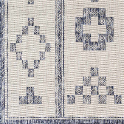 Besao Indoor & Outdoor Rug by Boutique Rugs with blue block motifs on beige ground on Tampa Home & Garden Store