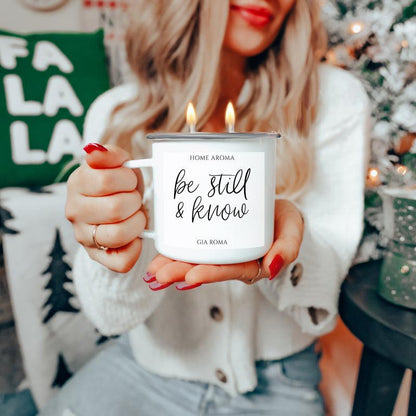 16oz white ceramic candle mug Gia Roma with be still & know label, two-wick lit on Tampa Home & Garden Store