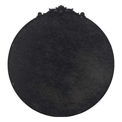 Round wall mirror back view with black patina metal and baroque crest at top on Tampa Home & Garden Store