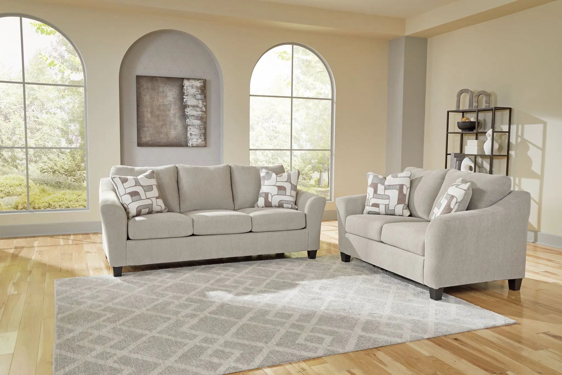 Willarae 2 Pc Taupe Sofa & Loveseat set by Unique Piece Furniture in a modern living room on Tampa Home & Garden Store