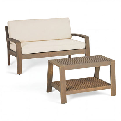 2 piece outdoor conversation set with loveseat & coffee table beige cushions on brown wood frame on Tampa Home & Garden Store