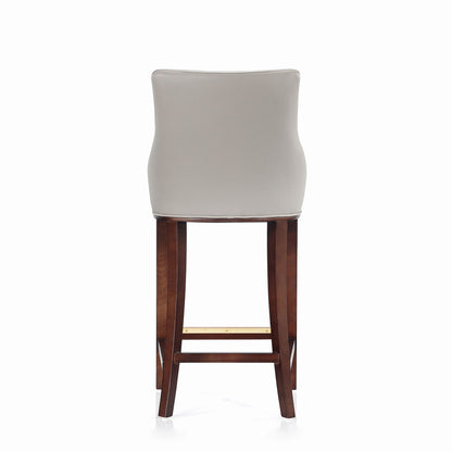 Shubert Barstool HouseOfZazla, bar-height chair with beige upholstery and dark wood legs on Tampa Home & Garden Store