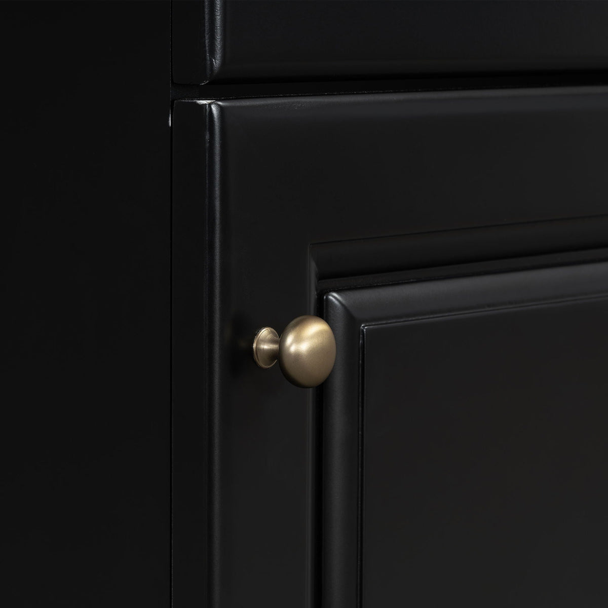 Bathroom vanity front closeup in black finish with brass knob hardware HouseOfZazla on Tampa Home & Garden Store